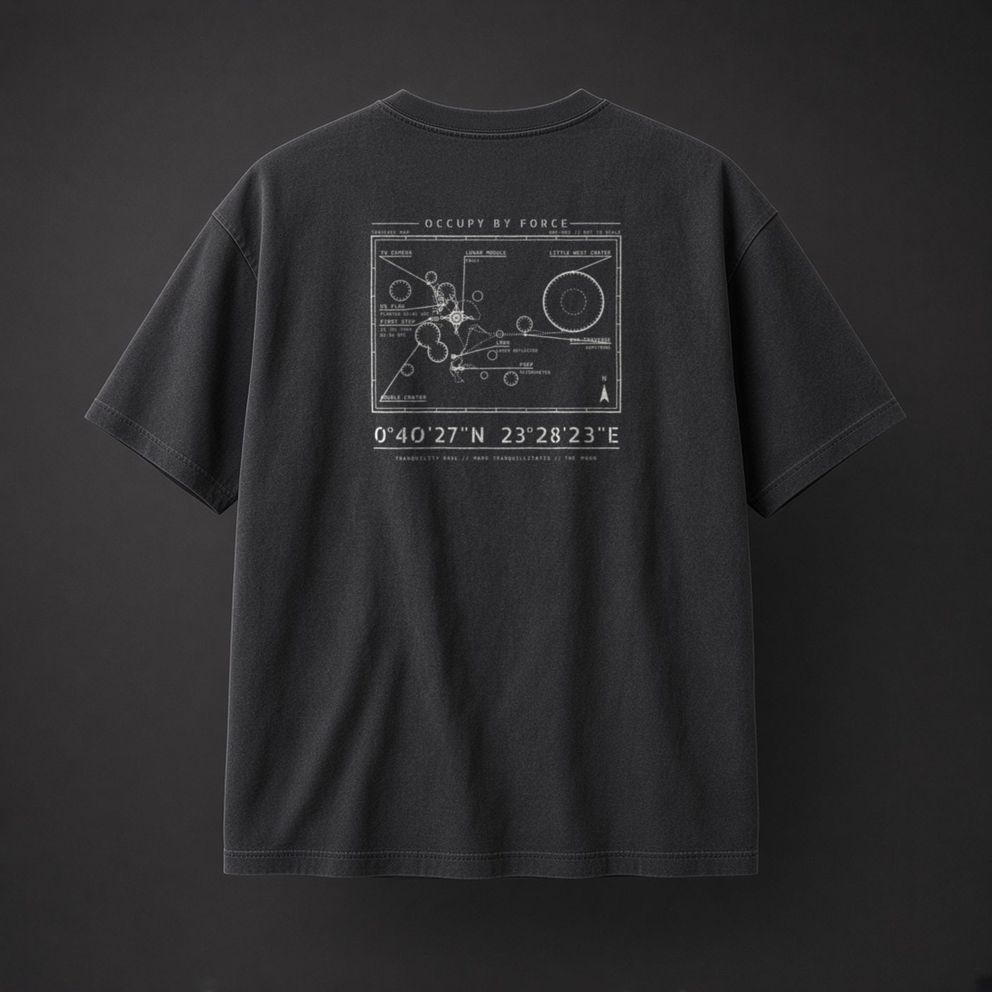 Apollo 11 history t-shirt in Black, back: overhead plan of Tranquility Base on the Moon, 1969 and coordinates 0°40'27"N 23°28'23"E